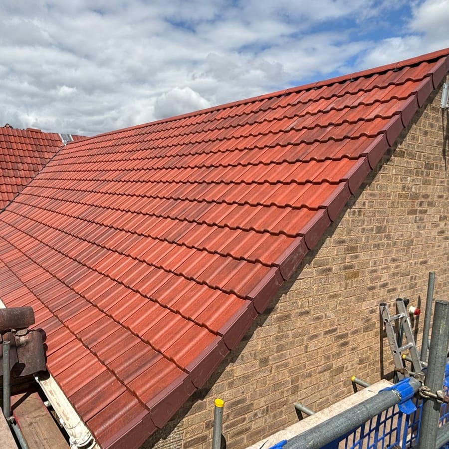 A finished new terracotta tiled roof