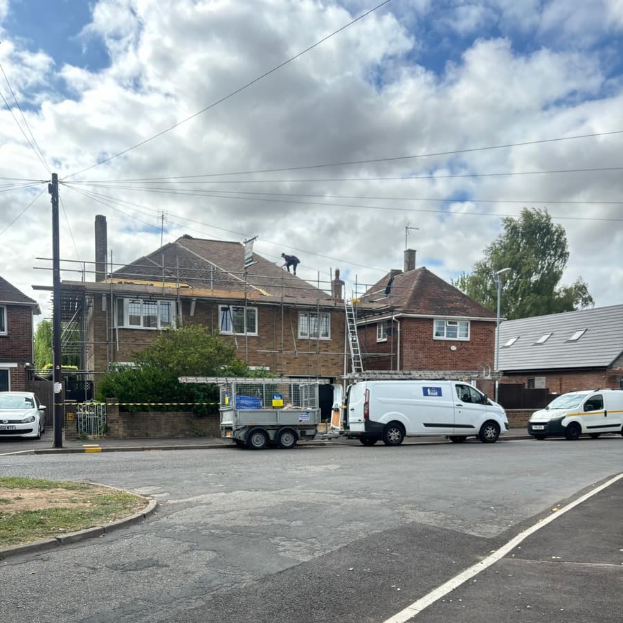 C R Smith & Son vans and scaffolding at a job