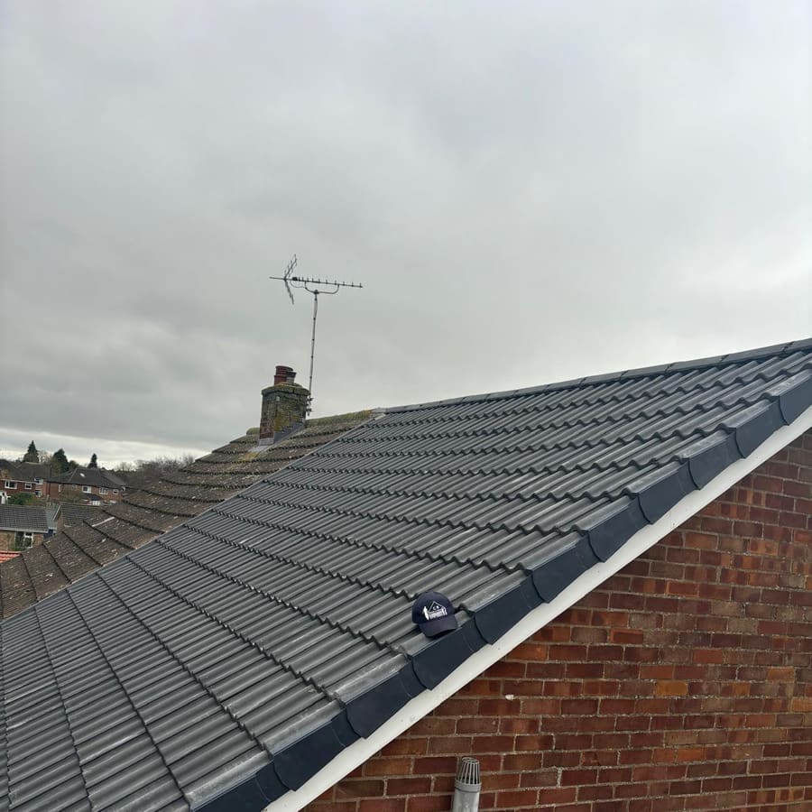 The completed re-roof in anthracite grey tiles
