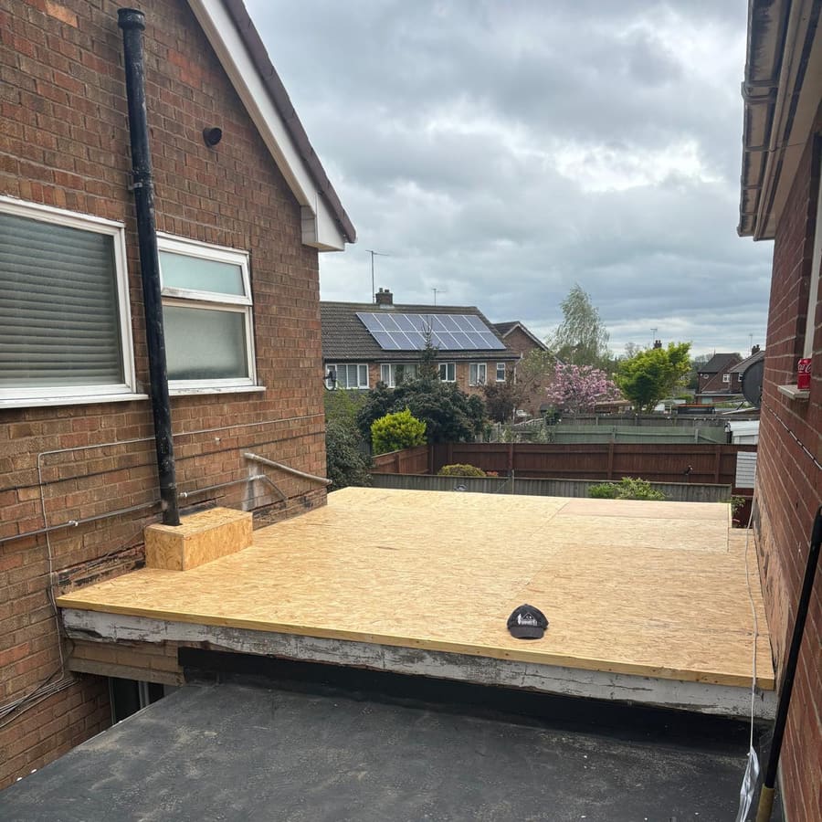 A new timber deck laid on the garage roof