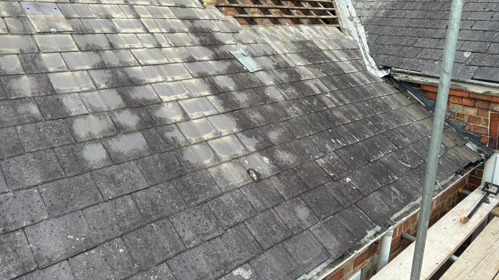 A badly damaged roof needing urgent repair
