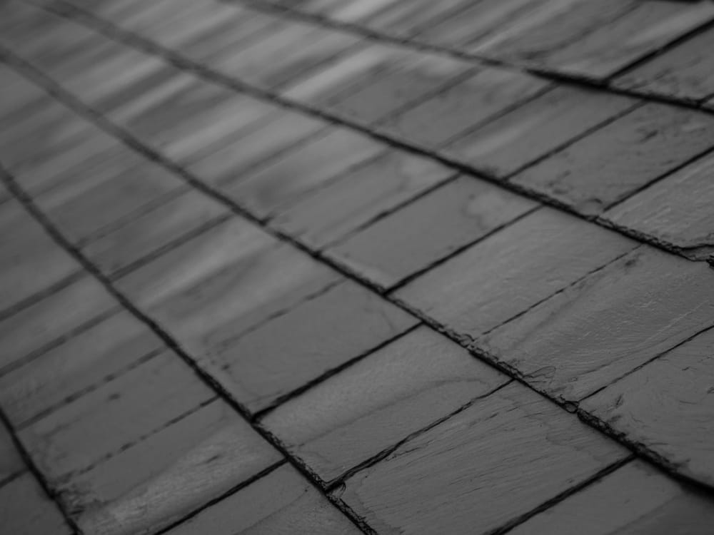 A finished natural grey slate roof